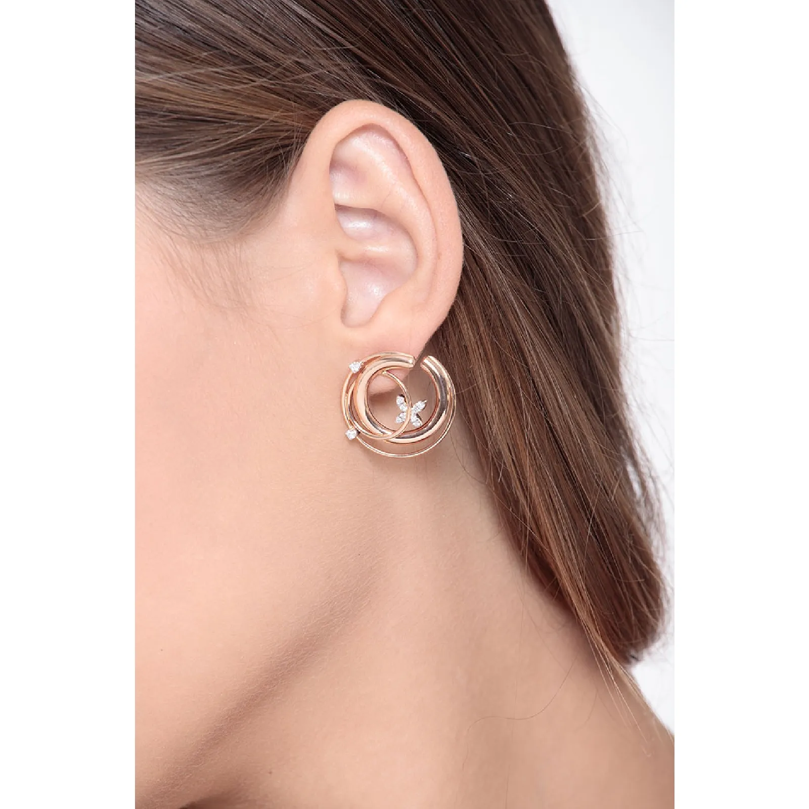 Orecchini a 3 file in oro rosa e bianco 18k con diamanti